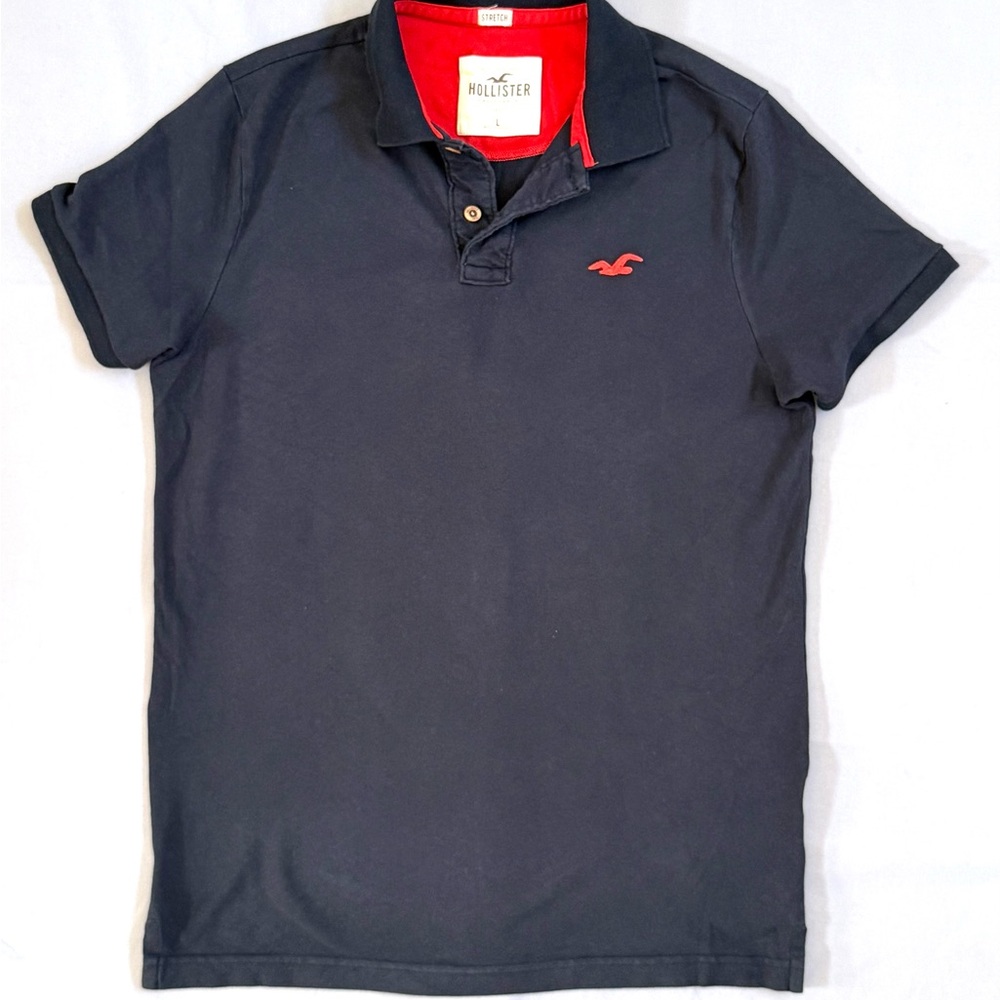 Hollister Men's Dark Blue Polo with Red Accents